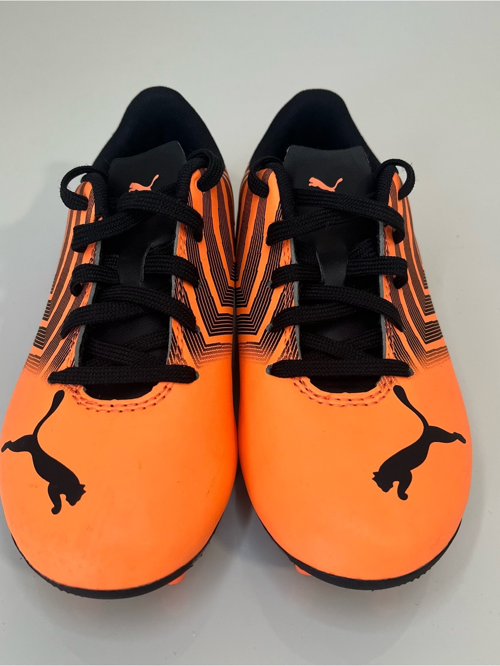 Puma Kids Orange and Black Soccer Sneakers